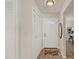 Entryway with coat closet and a cute welcome mat at 5210 Poinsetta Ave, Winter Park, FL 32792