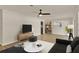 Cozy living room with ceiling fan, modern furniture, and lots of space at 5210 Poinsetta Ave, Winter Park, FL 32792