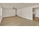 An open living room featuring wood floors, neutral paint, and an open floor plan at 5210 Poinsetta Ave, Winter Park, FL 32792