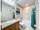 Bathroom with a vanity, mirror, granite countertop, tub, and shower at 5420 Windsor Lake Cir, Sanford, FL 32773