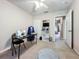 Bedroom with a sewing station, and view to hall at 5420 Windsor Lake Cir, Sanford, FL 32773