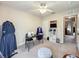 Bedroom with sewing table, accent chair and closet at 5420 Windsor Lake Cir, Sanford, FL 32773