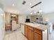Bright open-concept kitchen with eat in dining area, connecting seamlessly to the comfortable living space at 5420 Windsor Lake Cir, Sanford, FL 32773