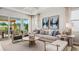 Stunning living room with comfortable seating, stylish decor, and an open layout for easy entertaining at 570 Hammock Oaks Blvd, Lady Lake, FL 32159