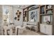 Inviting living room features a cozy seating area and custom built-in shelving, perfect for entertaining or relaxing at 570 Hammock Oaks Blvd, Lady Lake, FL 32159