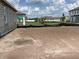 Unfinished backyard with a grass area waiting for finishing touches at 5706 Cattle Ranch Drive, St Cloud, FL 34771