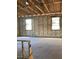 Interior view of block construction with concrete floors and exposed beams, ready for customization at 5706 Cattle Ranch Drive, St Cloud, FL 34771
