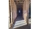 View of the interior framing in a new construction home with concrete flooring at 5706 Cattle Ranch Drive, St Cloud, FL 34771