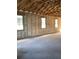 Interior view of block construction with concrete floors and exposed beams, ready for customization at 5706 Cattle Ranch Drive, St Cloud, FL 34771