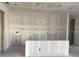 Kitchen area of home with drywall ready for paint and concrete flooring at 5706 Cattle Ranch Drive, St Cloud, FL 34771