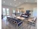 Inviting living room featuring stylish furniture, wood flooring and plenty of natural light at 5706 Cattle Ranch Drive, St Cloud, FL 34771