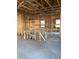 Spacious living room area shows the framing and electrical in this new construction home at 5706 Cattle Ranch Drive, St Cloud, FL 34771