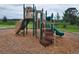 Community playground with climbing structures and multiple slides, designed for active play at 5706 Cattle Ranch Drive, St Cloud, FL 34771