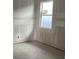 Unfinished room featuring a window for natural light at 5706 Cattle Ranch Drive, St Cloud, FL 34771
