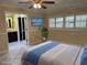 Bright bedroom with tile floors, ceiling fan, and ensuite bathroom at 645 Peachwood Dr, Altamonte Springs, FL 32714