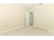 Bedroom featuring tile flooring, neutral walls, a closet with doors, and a ceiling fan at 645 Peachwood Dr, Altamonte Springs, FL 32714