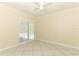 Bright bedroom with tile flooring, a sliding glass door, and a view of the pool outside at 645 Peachwood Dr, Altamonte Springs, FL 32714