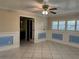 Spacious bedroom with tile floors, light-colored walls, and ample natural light at 645 Peachwood Dr, Altamonte Springs, FL 32714