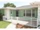 The exterior features a brick paver patio with white picket fence and views of the surrounding yard and landscaping at 645 Peachwood Dr, Altamonte Springs, FL 32714