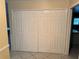 Hallway featuring a four-panel closet door and access to other rooms at 645 Peachwood Dr, Altamonte Springs, FL 32714