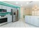 Updated kitchen features stainless steel appliances, modern countertops, and stylish tile flooring at 645 Peachwood Dr, Altamonte Springs, FL 32714