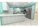 Well-designed kitchen with stainless steel appliances, modern countertops, and an island perfect for entertaining at 645 Peachwood Dr, Altamonte Springs, FL 32714
