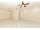 Open living room featuring tile flooring, modern fan, and neutral paint at 645 Peachwood Dr, Altamonte Springs, FL 32714
