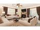 Inviting living room features a cozy fireplace, plush seating, and stylish decor at 645 Peachwood Dr, Altamonte Springs, FL 32714