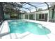 Large screened pool with connecting jacuzzi, ideal for outdoor recreation and relaxation at 645 Peachwood Dr, Altamonte Springs, FL 32714