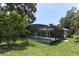 Screened-in pool provides a private and refreshing oasis for relaxation and recreation at 645 Peachwood Dr, Altamonte Springs, FL 32714