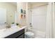 Full bath with shower-tub combo and single sink vanity with chrome fixtures and a white countertop at 671 Drop Shot Dr, Davenport, FL 33896