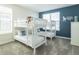 Bedroom featuring bunkbeds with carpet flooring and natural light from the window at 671 Drop Shot Dr, Davenport, FL 33896