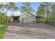 Well-maintained barn with ample storage space, ideal for hobbies or equipment at 6975 Maverick Trl, St Cloud, FL 34771