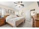 Comfortable main bedroom with stylish furnishings and natural light, leading into the kitchen at 6975 Maverick Trl, St Cloud, FL 34771
