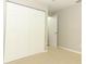 Bedroom with a closet and neutral colored walls at 708 Wilson Rd, Winter Springs, FL 32708