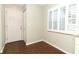 Bright entryway featuring a window with shutters and light-colored walls at 708 Wilson Rd, Winter Springs, FL 32708