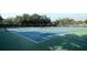 Community tennis courts with a green and blue color scheme at 708 Wilson Rd, Winter Springs, FL 32708