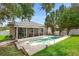 Outdoor living at its finest with a screened-in porch and sparkling pool at 714 Home Grove Dr, Winter Garden, FL 34787