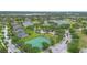 Aerial view of community amenities including a pool, clubhouse, park, and tennis court at 714 Home Grove Dr, Winter Garden, FL 34787
