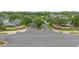 Entrance to the Regency Oaks community with manicured landscaping and signage at 714 Home Grove Dr, Winter Garden, FL 34787