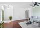 Open living space boasting hardwood floors, neutral paint, and an open floorplan at 714 Home Grove Dr, Winter Garden, FL 34787