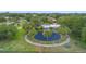 Aerial view of the community playground including shade and seating at 714 Home Grove Dr, Winter Garden, FL 34787