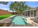 Inviting pool, screened lanai, and lounge chairs create a serene backyard retreat at 714 Home Grove Dr, Winter Garden, FL 34787