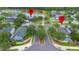 Street view of the community entrance with landscaping and a view of the pond at 714 Home Grove Dr, Winter Garden, FL 34787