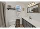 Bright bathroom with a single sink vanity, updated fixtures, and décor at 722 Ridgewood Way, Winter Springs, FL 32708
