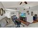 Comfortable living room with hardwood floors, vaulted ceiling, and bright decor at 722 Ridgewood Way, Winter Springs, FL 32708