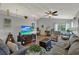 Inviting living room with hardwood floors, vaulted ceiling, and bright decor at 722 Ridgewood Way, Winter Springs, FL 32708