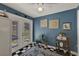 Sunroom with a checkerboard floor, plants, decor, and access to the yard via french doors at 722 Ridgewood Way, Winter Springs, FL 32708