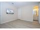 Unfurnished bedroom boasts recessed lighting, modern flooring, and is conveniently located next to the bathroom at 8419 Pippen Dr, Orlando, FL 32836