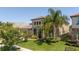 Lovely landscaped front yard with a three-car garage and a brick-paved driveway at 8419 Pippen Dr, Orlando, FL 32836